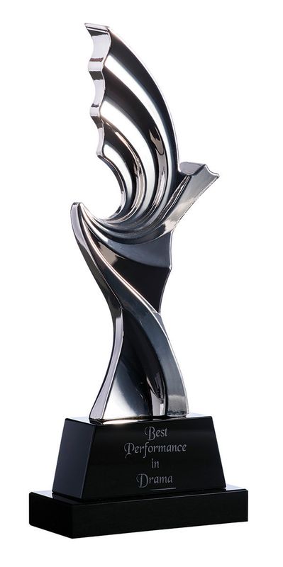Silver figurine on black crystal base